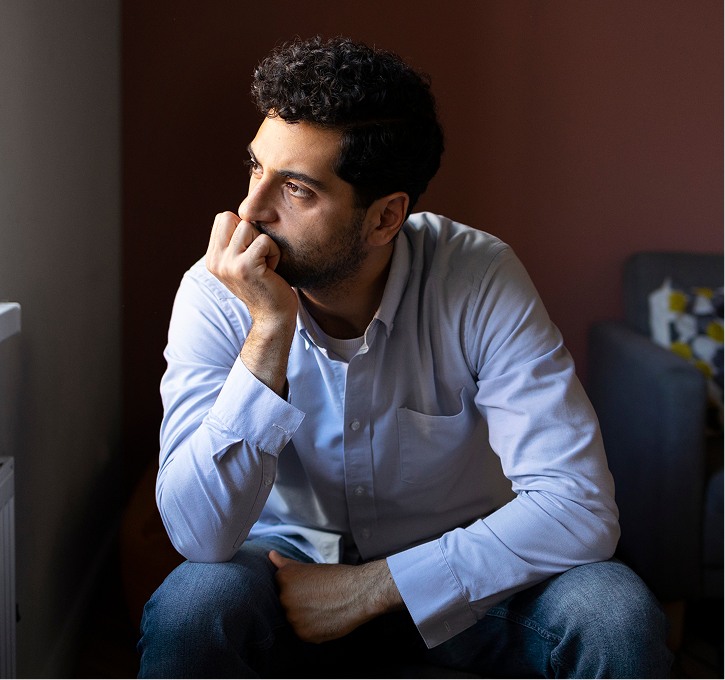 Man sitting in thought – online psychiatry in Sacramento, CA